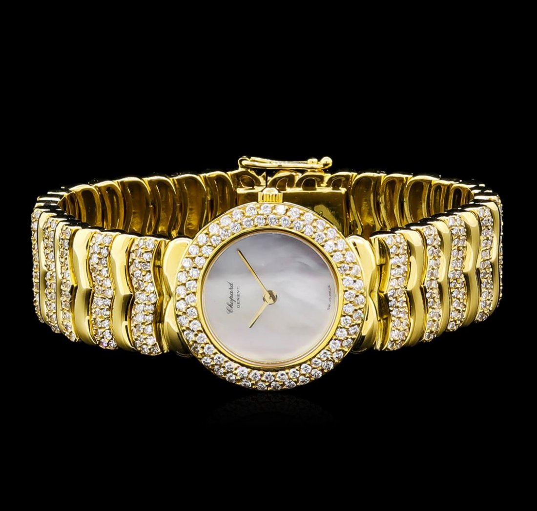 Chopard 18KT Yellow Gold 5.00 ctw Diamond Ladies Watch: One ladies, Chopard Diamond wrist watch electronically tested 18KT yellow gold, Case: 23mm, Case Back: space available for engraving, Crown: scalloped, Bezel: diamond set, Crystal: synthetic sapphire,