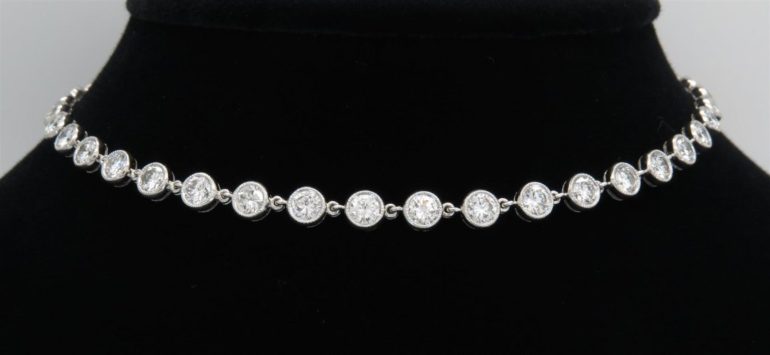 Julius Cohen 11.00 ctw Diamond Necklace - Platinum: One tested platinum designer Julius Cohen diamond necklace. Containing: 44 Round Brilliant Cut Diamonds. Clarity: VS-SI, Color: F-H. Approximate total diamond weight: 11.00CTW. All diamonds are grad