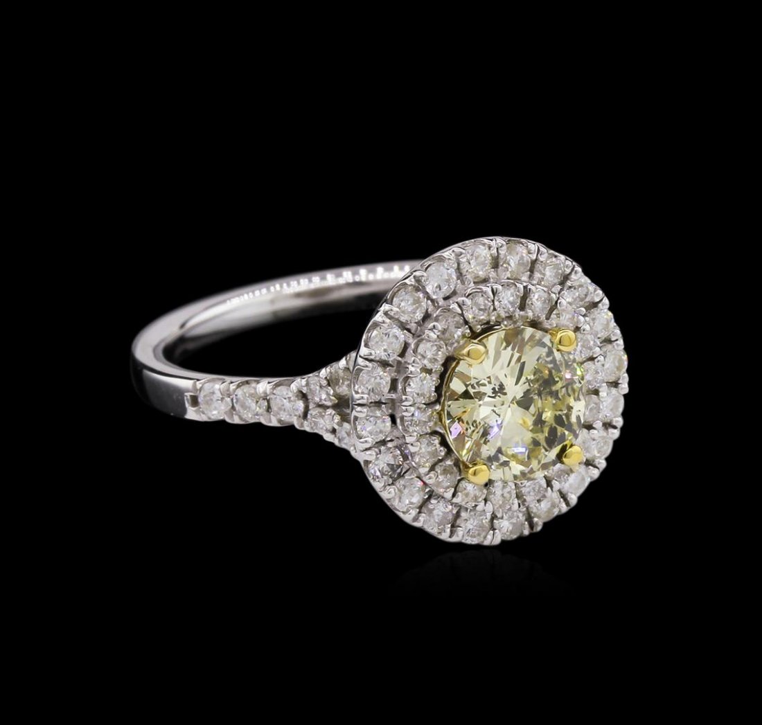 GIA Certified 14KT White Gold 1.00 ctw Yellow Diamond: One electronically tested 14KT white gold ladies cast diamond unity ring with a bright polish finish. Condition is new, good workmanship. The featured diamond is set within a yellow gold basket and pl