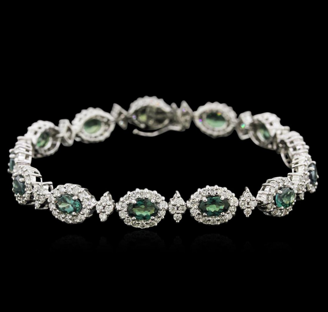 7.80 ctw Alexandrite and Diamond Bracelet - 14KT White: One electronically tested 14KT white gold lady's combination cast & assembled fashion bracelet with a tongue clasp with foldover safety with a bright polish finish. The featured lady's bracelet contai