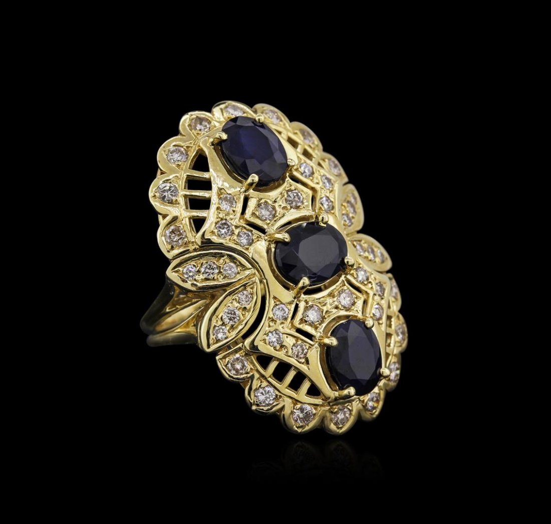 14KT Yellow Gold 5.01 ctw Sapphire and Diamond Ring: One electronically tested 14KT yellow gold ladies cast sapphire and diamond ring with a bright polish finish. Identified with markings of "14K". Condition is new. Containing: Three prong set oval oval