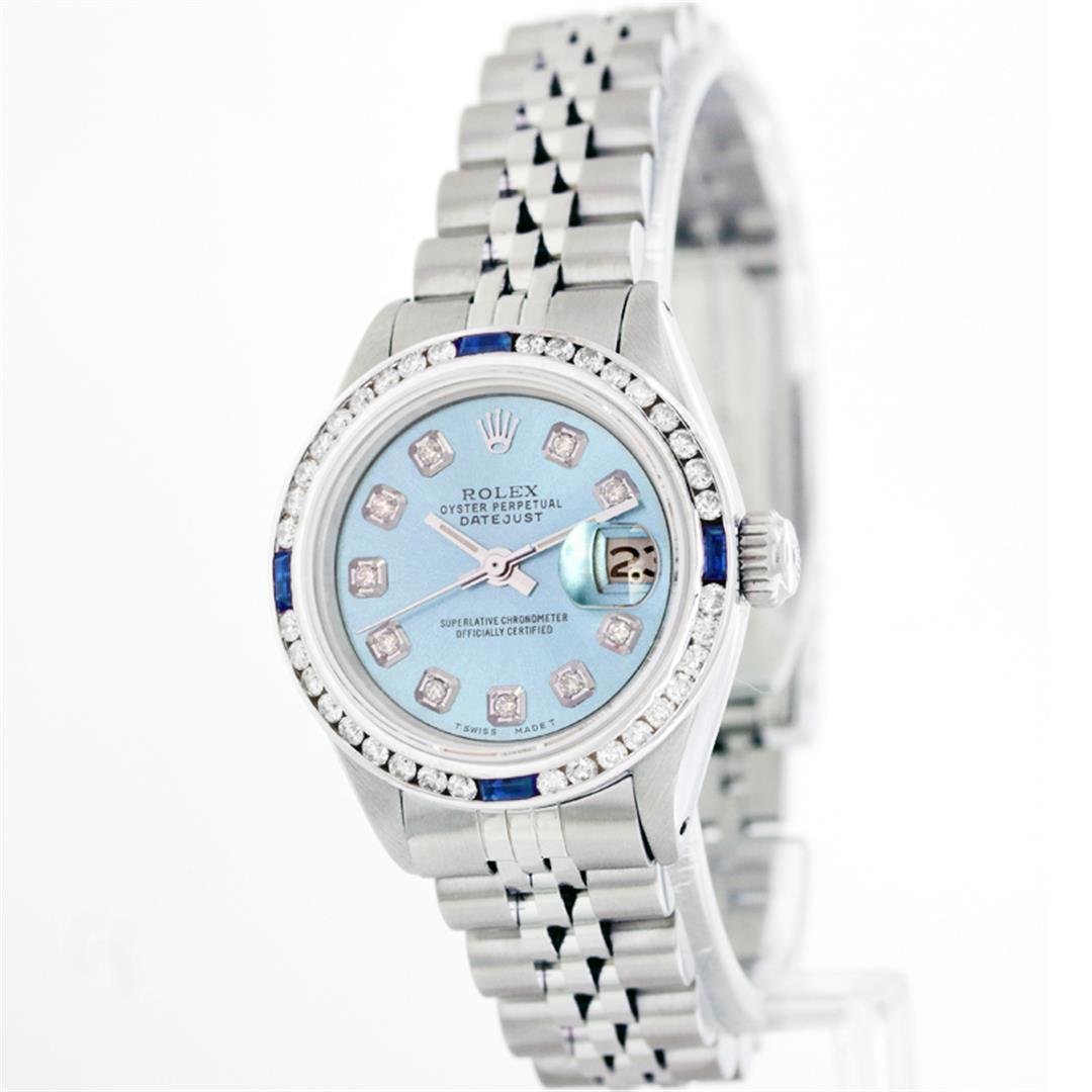 Rolex Stainless Steel 1.00 ctw Diamond and Sapphire: One Ladies Rolex Datejust Polished Bright with Satin Finish, Serviced & Electronically Tested, Stainless Steel Case:26mm, Stainless Steel Crown, Custom Bezel: 18K White Gold Sapphire Channel Set Diamo