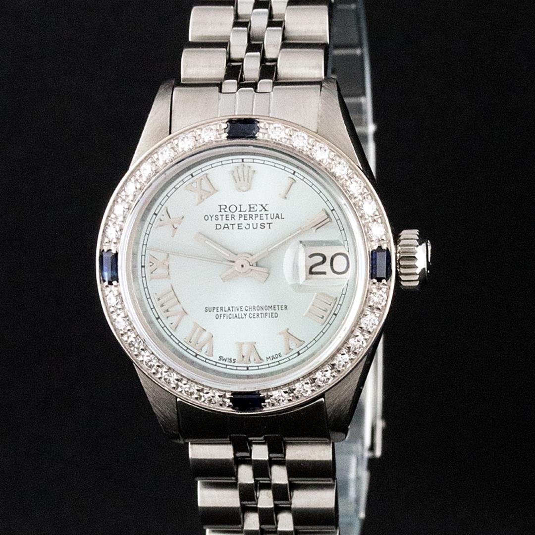 Rolex Stainless Steel Ice Blue Diamond and Sapphire: One Ladies Rolex Datejust Polished Bright with Satin Finish, Serviced & Electronically Tested, Stainless Steel Case:26mm, Stainless Steel Crown, Custom Bezel: 18K White Gold Sapphire Beadset Diamond B