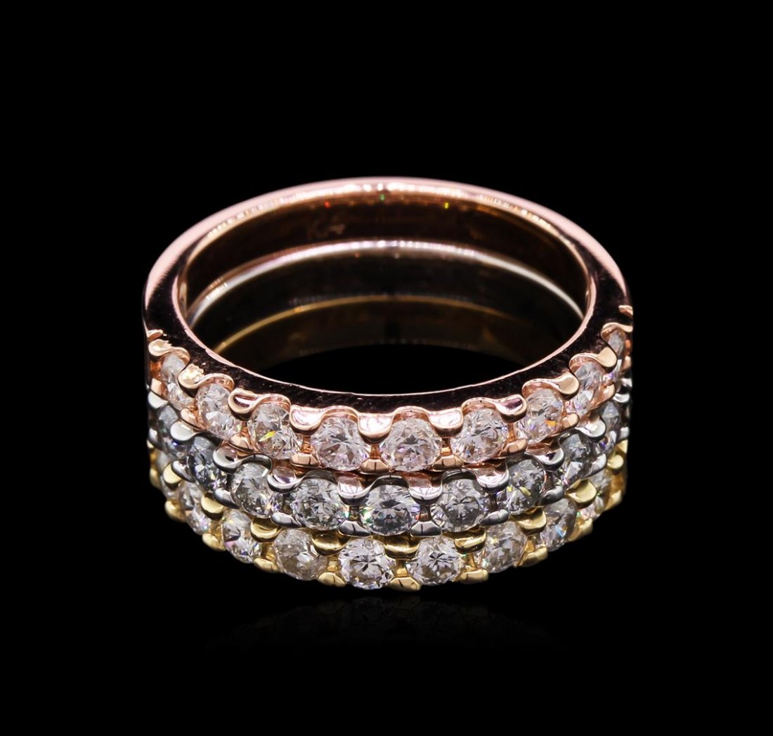 1.65 ctw Diamond Stackable Rings - 14KT Tri-Color Gold: One set electronically tested 14KT yellow, white, and rose gold lady's cast stackable rings with a bright polish finish. The featured lady's ring set has a triple shank measuring 8.15 millimeters wide