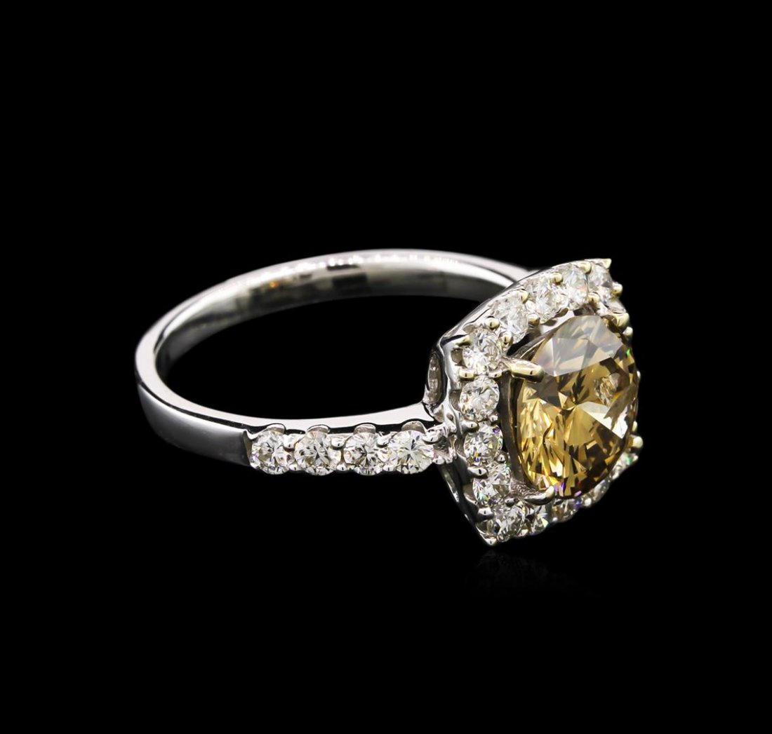 GIA Cert 2.92 ctw Fancy Diamond Ring - 18KT White Gold: One electronically tested 18KT white gold ladies cast diamond ring with a bright polish finish. Condition is new, good workmanship. The featured diamond is set within a diamond bezel supported by diam