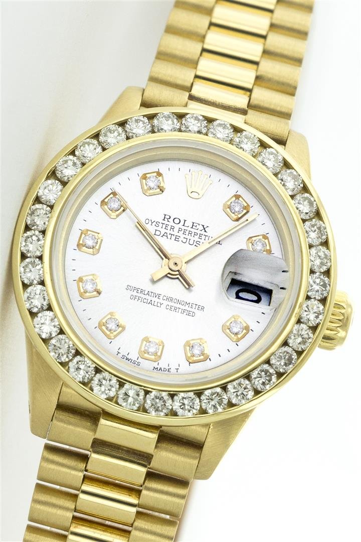 Rolex 18K Gold President 2.00 ctw Diamond Ladies Watch: One Ladies 18K Rolex President Polished, Serviced & Electronically Tested, 18K Yellow Gold Case: 26mm, Yellow Gold Crown, Bezel: 18K Yellow Gold 2ctw Channel Set Diamond Bezel, Diamond Count: 32 Diamo