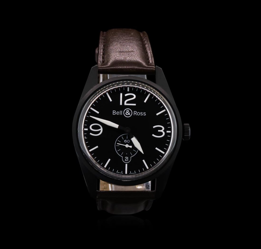Bell & Ross Stainless Steel Black PVD Mens Watch: One Bell & Ross stainless steel mens watch. Strap: brown leather. Case: stainless steel black PVD. Dial: black with one subdial with second hand and date located at the 6 o'clock position. The leather
