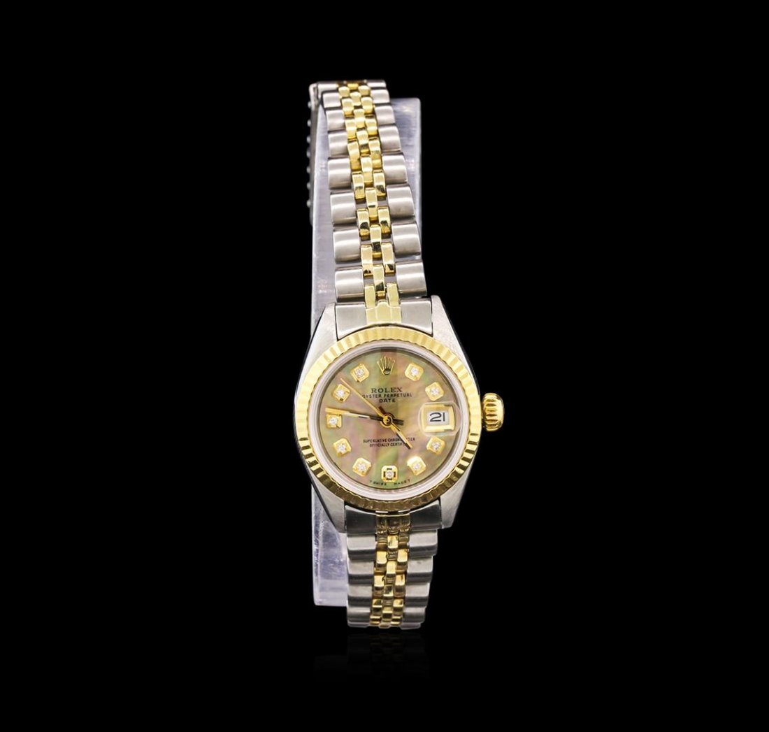 Rolex Two-Tone DateJust Ladies Watch: One ladies, hand crafted & machine milled Rolex two-tone DateJust wristwatch electronically tested; Circa: 1980, stainless steel Case: 26mm oyster, 14KT yellow gold Crown: twinlock with logo, 14KT yel