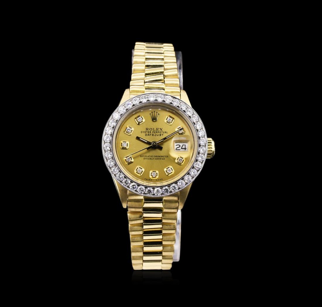 Rolex 18KT Gold President 1.06 ctw Diamond DateJust: One ladies, hand crafted & machine milled Rolex Lady President the DateJust model wristwatch electronically tested 18KT yellow gold, Circa: 1972, Case: 25mm oyster, Crown: twinlock with logo, Custom B
