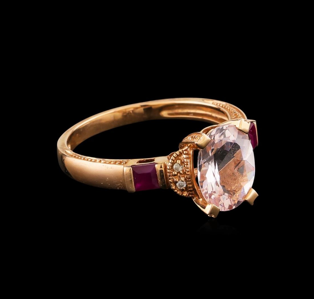1.87 ctw Morganite, Ruby and Diamond Ring - 14KT Rose: One electronically tested 14KT rose gold ladies cast colored gemstone and diamond ring. The featured morganite is set between mirroring diamond duos supported by laboratory created ruby set shoulders,