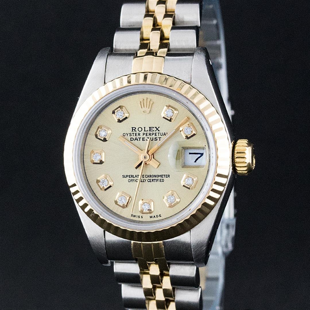 Rolex Two-Tone Champagne Diamond DateJust Ladies Watch: One Ladies Two Tone Rolex Datejust Polished, Serviced & Electronically Tested, 14K Yellow Gold & Stainless Steel Case:26mm, 14K Yellow Gold Crown, Bezel: 14K Yellow Gold Fluted Bezel. Custom Crystal: 