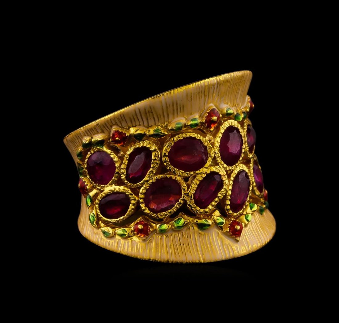 Sterling Silver Ring: One of a kind high fashion sterling silver Ring weighing 12.7 grams. Containing: Ruby, White Enamel Inlay, Red Enamel Inlay, Green Enamel Inlay. This sterling silver promises a lasting shine.