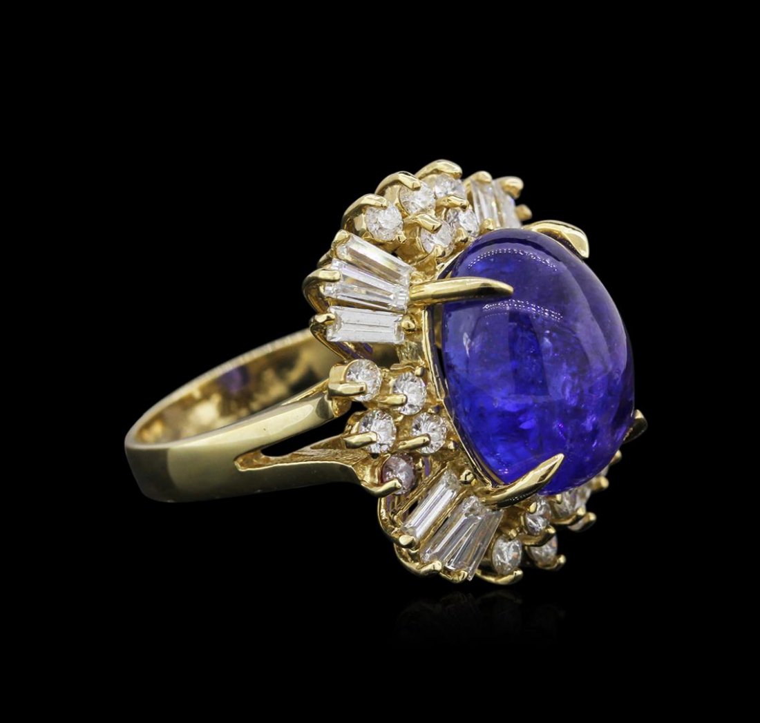 14KT Yellow Gold 10.10 ctw Tanzanite and Diamond Ring: One electronically tested 14KT yellow gold ladies cast tanzanite and diamond ring with a bright polish finish. Identified with markings of "14K". Condition is new. Containing: One prong set oval caboc