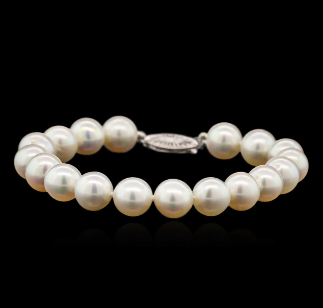 Fresh Water Pearl Bracelet - 14KT White Gold: One bracelet featuring: 14KT white gold weighing 16.63 grams containing 8mm fresh water pearls.