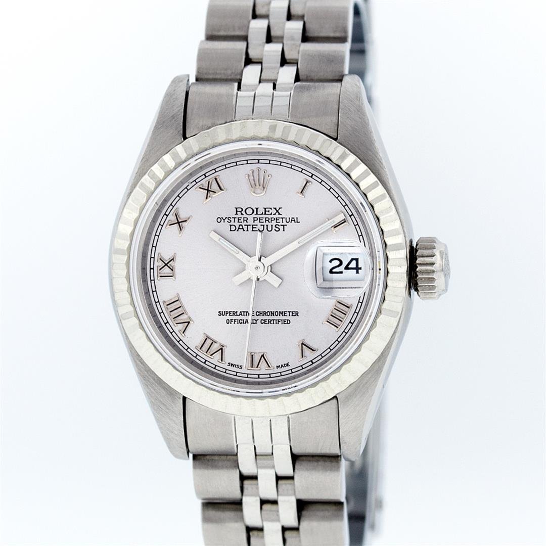 Rolex Stainless Steel Silver Roman DateJust Ladies: One Ladies Rolex Datejust Polished Bright with Satin Finish, Serviced & Electronically Tested, Stainless Steel Case:26mm, Stainless Steel Crown, Bezel:14K White Gold Fluted. Custom Crystal: Acrylic Cy