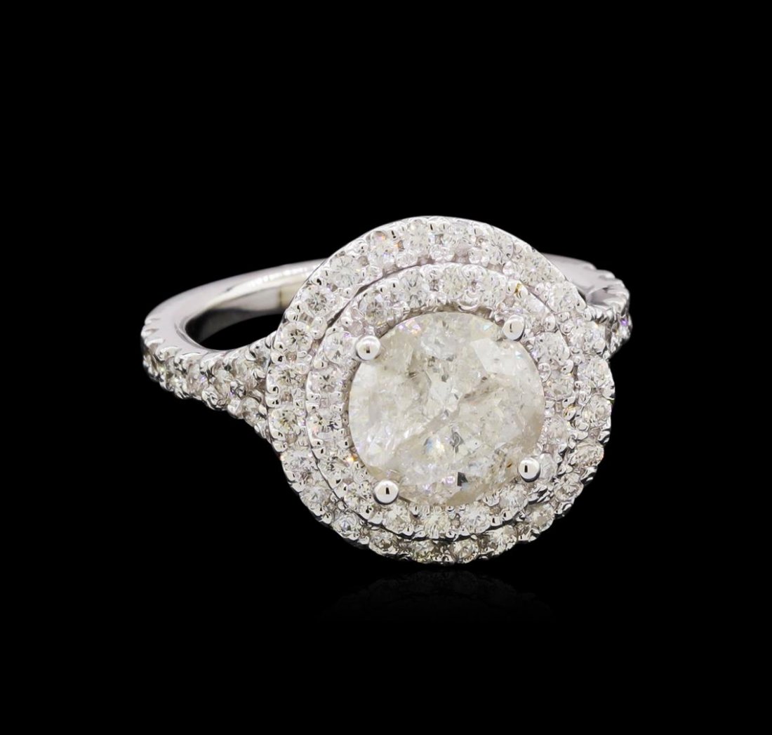 2.68 ctw Diamond Ring - 14KT White Gold: One electronically tested 14KT white gold lady's cast wedding ring with a split shank double basket halo with a bright polish finish. The featured lady's ring has a shank measuring 2.06 millimeters wi
