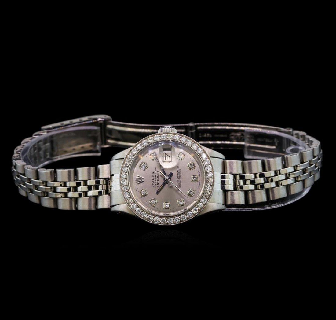 Rolex Stainless Steel Diamond DateJust Ladies Watch: One ladies, hand crafted & machine milled Rolex DateJust model stainless steel wristwatch electronically tested, Case: 26mm oyster, Crown: twinlock with logo, Custom Bezel: diamond set, Custom Crystal