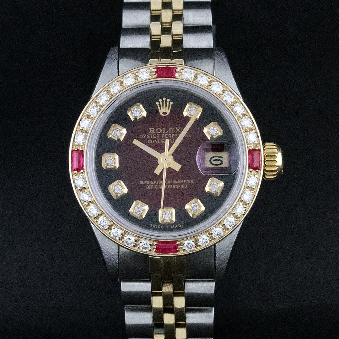 Rolex Two-Tone Red Vignette Diamond and Ruby DateJust: One Ladies Two Tone Rolex Datejust Polished, Serviced & Electronically Tested, 14K Yellow Gold & Stainless Steel Case:26mm, 14K Yellow Gold Crown, Custom Bezel: 18K Yellow Gold Ruby Beadset Diamond Be