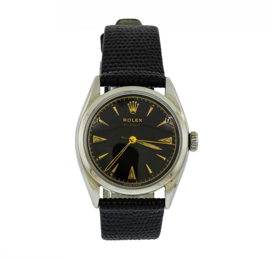 Stainless Steel Vintage Rolex Oyster Wristwatch: One Mens hand crafted and machine milled stainless steel Vintage Rolex Oyster wristwatch. Reference Number: 6022. Movement: Mechanical with manual winding, 17 jewels. Case: Measures 34mm in diameter,