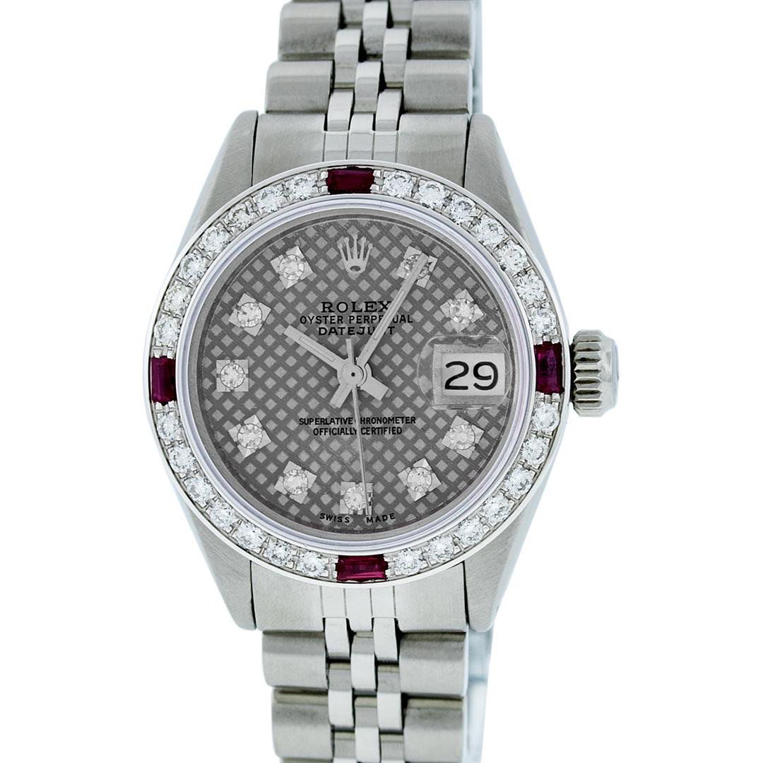 Rolex Stainless Steel VVS Diamond and Ruby DateJust: Ladies Rolex Datejust Polished Bright with Satin Finish, Serviced & Electronically Tested, Stainless Steel Case:26mm, Stainless Steel Crown, Custom Bezel: 18K White Gold Ruby Beadset Diamond Bezel, Di