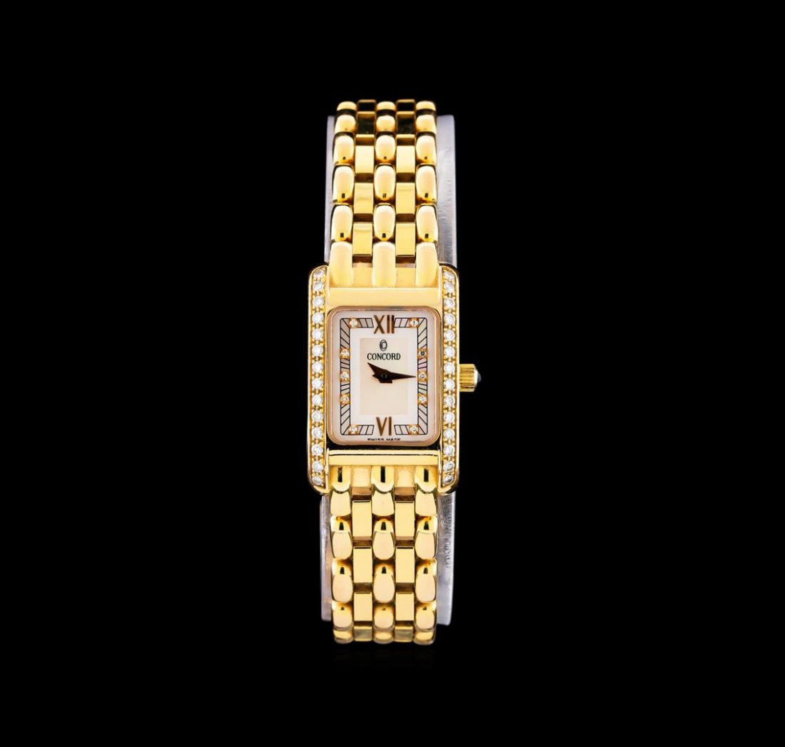 Concord 18KT Gold Diamond Veneto Mini Ladies Watch: One ladies, Concord Veneto Mini Diamond wristwatch, electronically tested 18KT yellow gold, Case: 26 x 17mm, Swiss Hallmarked Case Back: secured by four set screws, space available for engraving, Crow