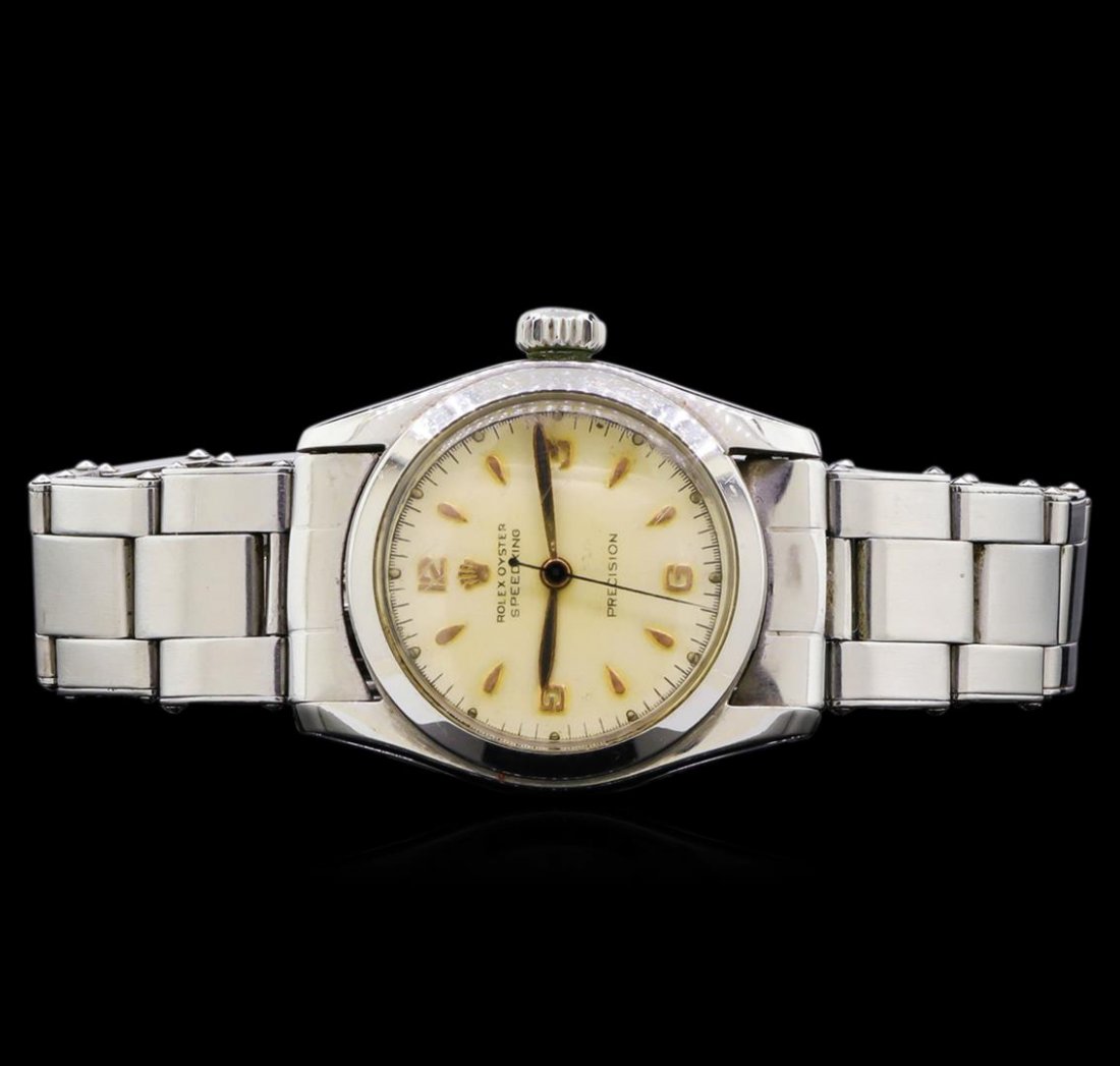 Rolex Oyster Speedking Watch: One Rolex Oyster Speedking watch featuring: Case: round, 36 x 29mm, steel. Bezel: Steel. Dial: Beige with gold colored dot markers and Arabic numerals at 3, 6, 9 and 12 o'clock. Movement: Manual. Crys