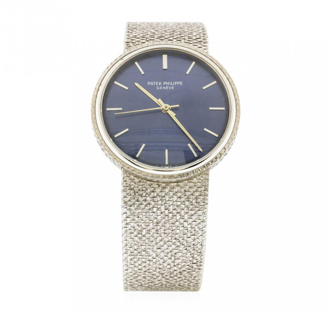 Patek Philippe 18KT White Gold Men's Watch: One gents, Patek Philippe Calatrava wristwatch electronically tested 18KT White gold. Case: 34mm diameter, Case Back: available space for engraving, Crown: located on the Case Back, Bezel: linen-textu