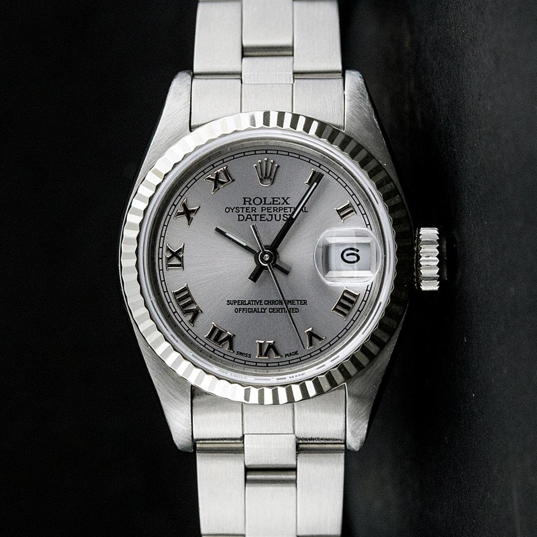 Rolex SS Slate Grey Roman With Square Track Oyster Band: One Ladies Rolex Datejust Polished Bright with Satin Finish, Serviced & Electronically Tested, Stainless Steel Case:26mm, Stainless Steel Crown, Bezel:14K White Gold Fluted. Custom Crystal: Acrylic Cy