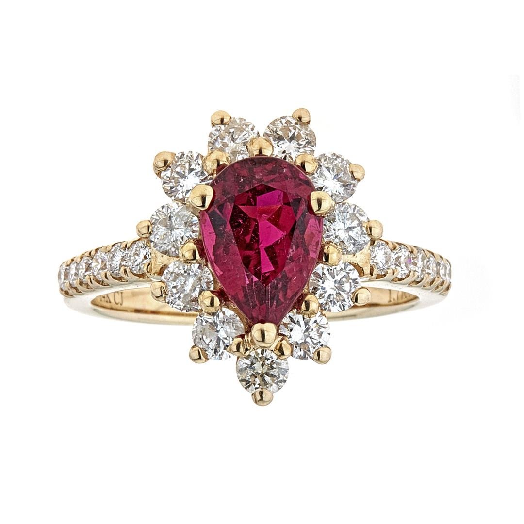 1.77 ctw Rubellite and Diamond Ring - 14KT Yellow Gold: One Lady's Rubellite and Diamond Ring. Setting: 14 Kt. Yellow Gold Mounting. Additional: 23 Round Diamonds = 1.15 Cts. TWT (H-I/SI-I). Center Gem Stone Information: Species: Natural Tourmaline. Variet