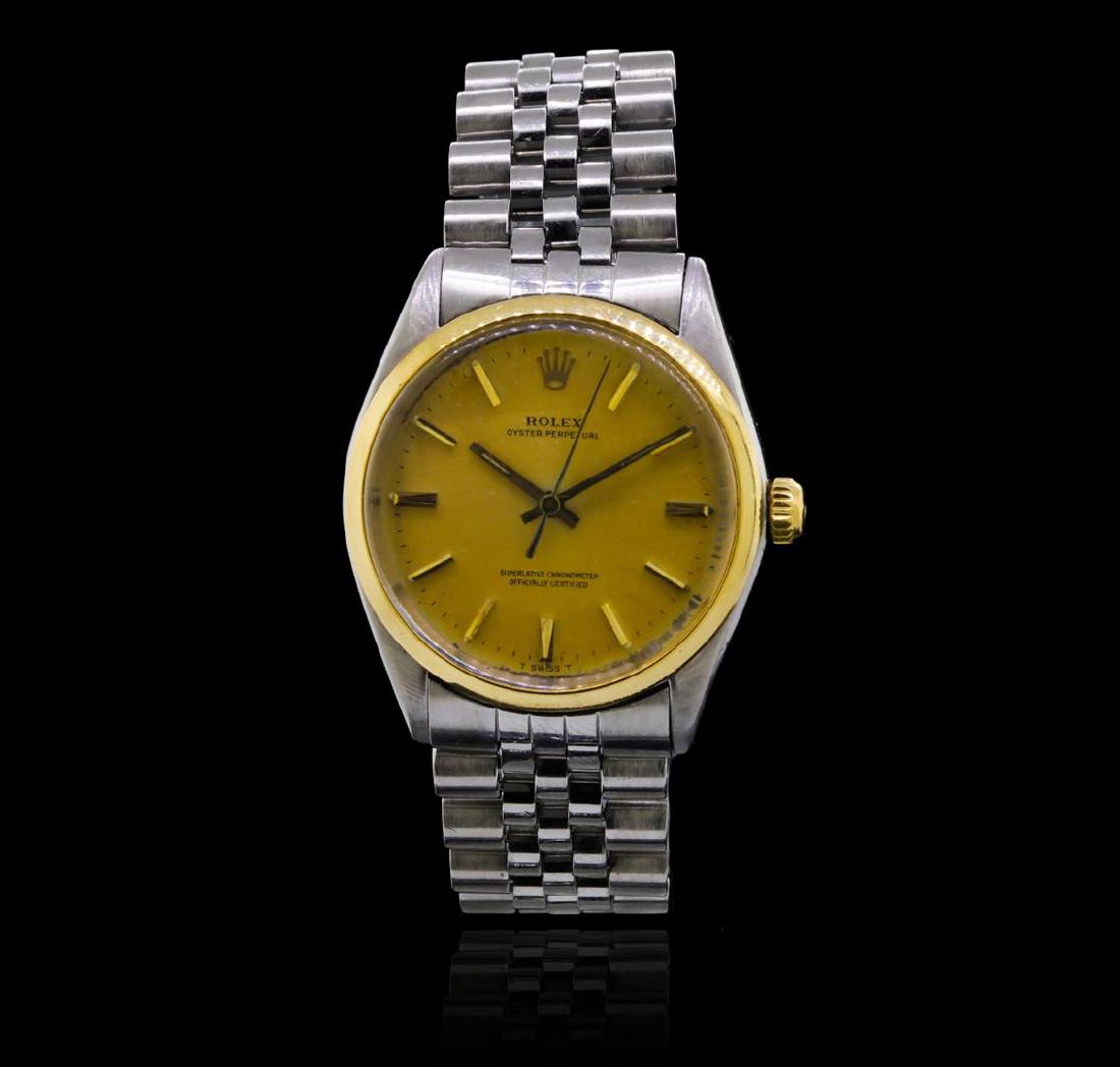 Rolex Stainless Steel Oyster Perpetual Men's Vintage: One, gents, hand crafted & machine milled Rolex Oyster Perpetual wristwatch electronically tested Stainless Steel, Case: 35mm oyster, Crown: 14KT yellow gold twinlock, with Rolex logo, Bezel: 14KT yel