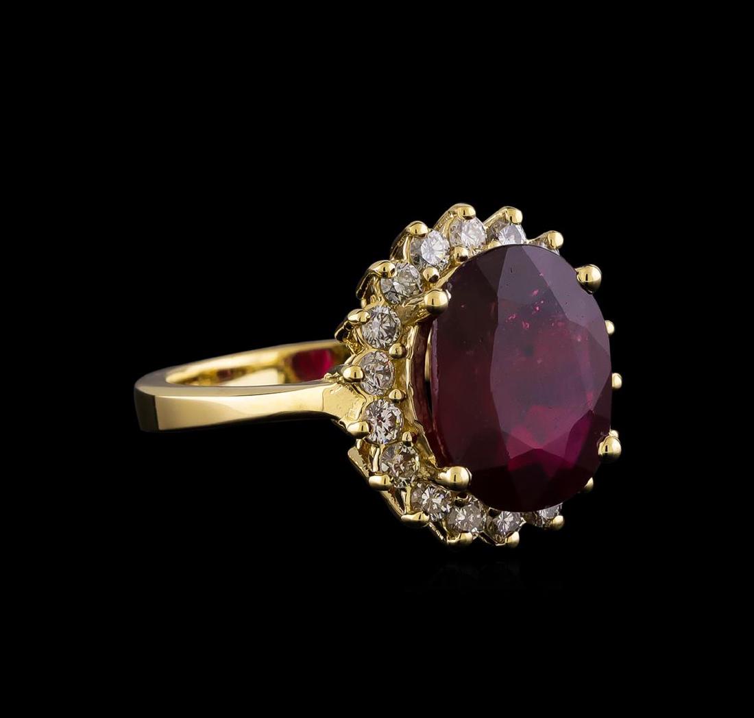 5.40 ctw Ruby and Diamond Ring - 14KT Yellow Gold: One ring featuring: 14KT Yellow gold weighing 5.30 grams containing one Ruby with a total weight of 5.40ct and diamonds with a total weight of 0.60ctw.