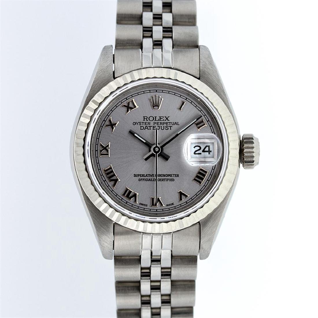 Rolex Stainless Steel Slate Grey Roman DateJust Ladies: One Ladies Rolex Datejust Polished Bright with Satin Finish, Serviced & Electronically Tested, Stainless Steel Case:26mm, Stainless Steel Crown, Bezel: 14K White Gold Fluted. Custom Crystal: Acrylic C