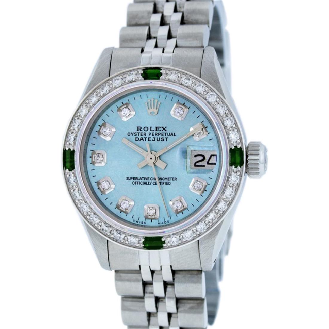 Rolex Stainless Steel Diamond and Emerald DateJust: Ladies Rolex Datejust Polished Bright with Satin Finish, Serviced & Electronically Tested, Stainless Steel Case:26mm, Stainless Steel Crown, Custom Bezel: 18K White Gold Emerald Beadset Diamond Bezel,