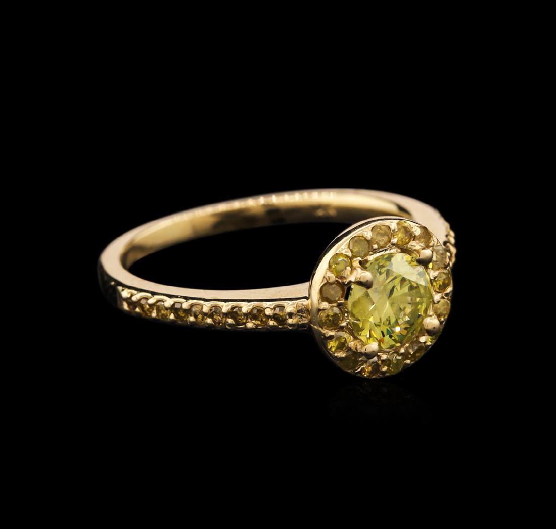 1.03 ctw Yellow Diamond Ring - 14KT Yellow Gold: One ring featuring: 14KT yellow gold weighing 3.27 grams containing one yellow diamond center stone with a total weight of 0.72ct and 34 yellow side diamonds with a total weight of 0.31ct.
