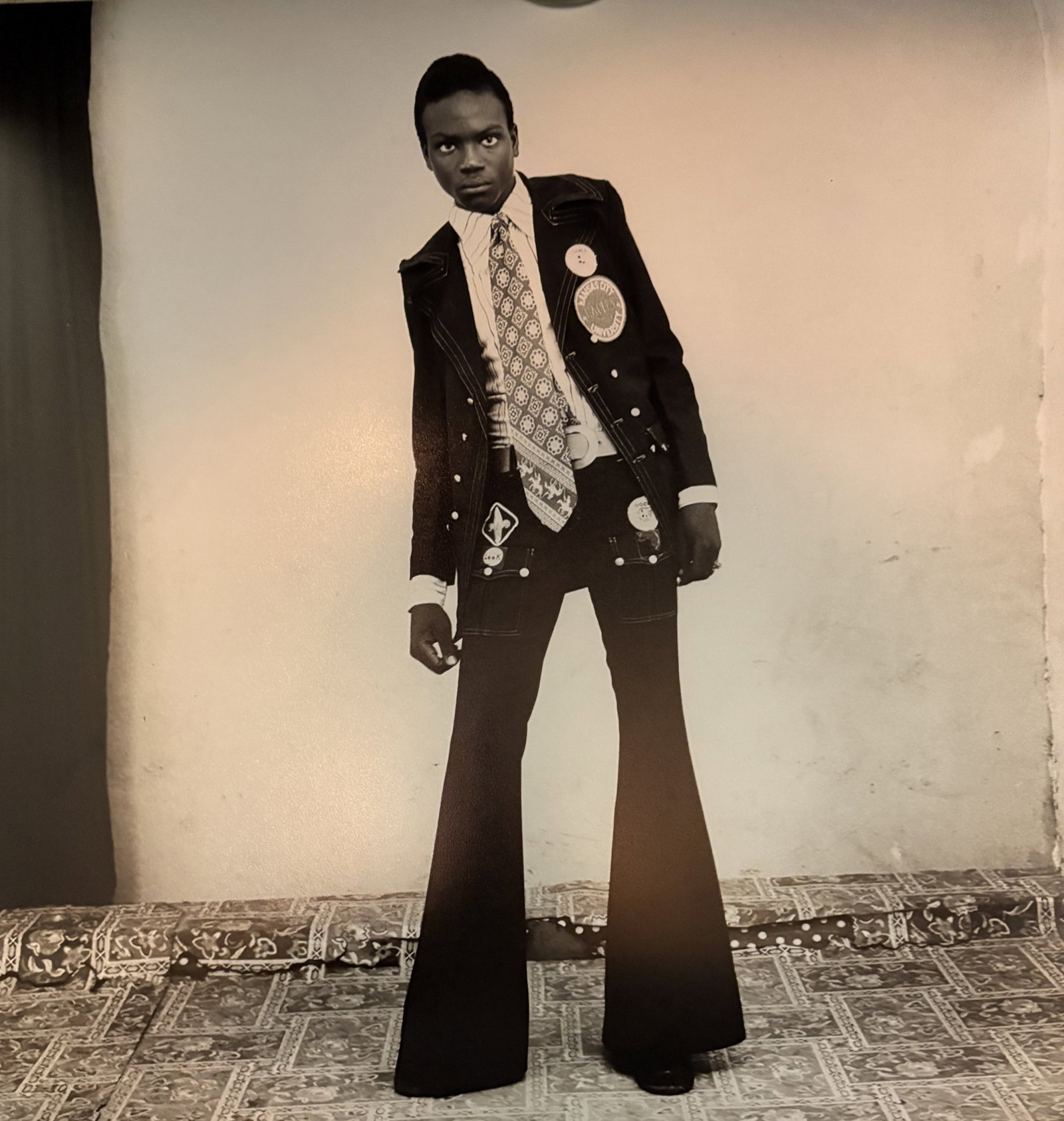 MALICK SIDIBE 'UN GENTLEMAN AVEC' PHOTO LITHO: Malick Sidibe 'Un Gentleman Avec' Photo Lithograph mounted onto Board measuring at 19x19 inches. Printed Later.