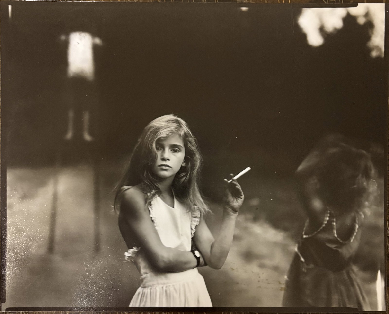 SALLY MANN 'CANDY CIGARETTE' PRINT: Sally Mann 'Candy Cigarette' Print professionally mounted onto conservation board. Print measures at 8x10 inches. Printed Later.