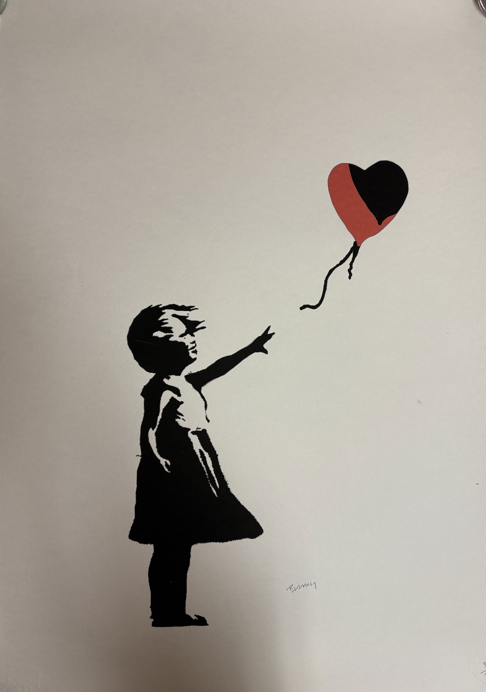 BANKSY 'GIRL WITH BALLOON' LITHOGRAPH: Banksy 'Girl with Balloon' Lithograph measuring at 19.75x27.5 inches. Embossed stamp in the lower right corner. Pencil signed and numbered 95/100.