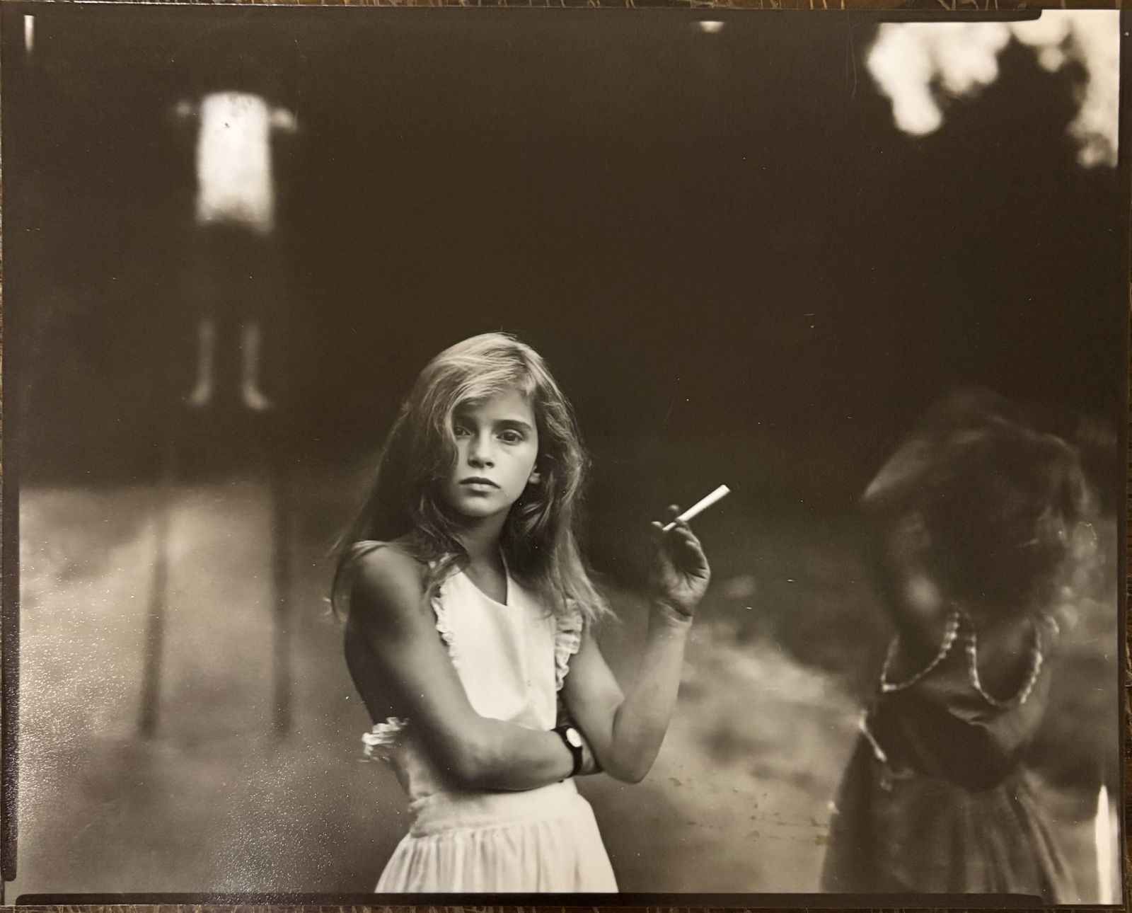 SALLY MANN 'CANDY CIGARETTE' PRINT: Sally Mann 'Candy Cigarette' Print professionally mounted onto conservation board. Print measures at 8x10 inches. Printed later.