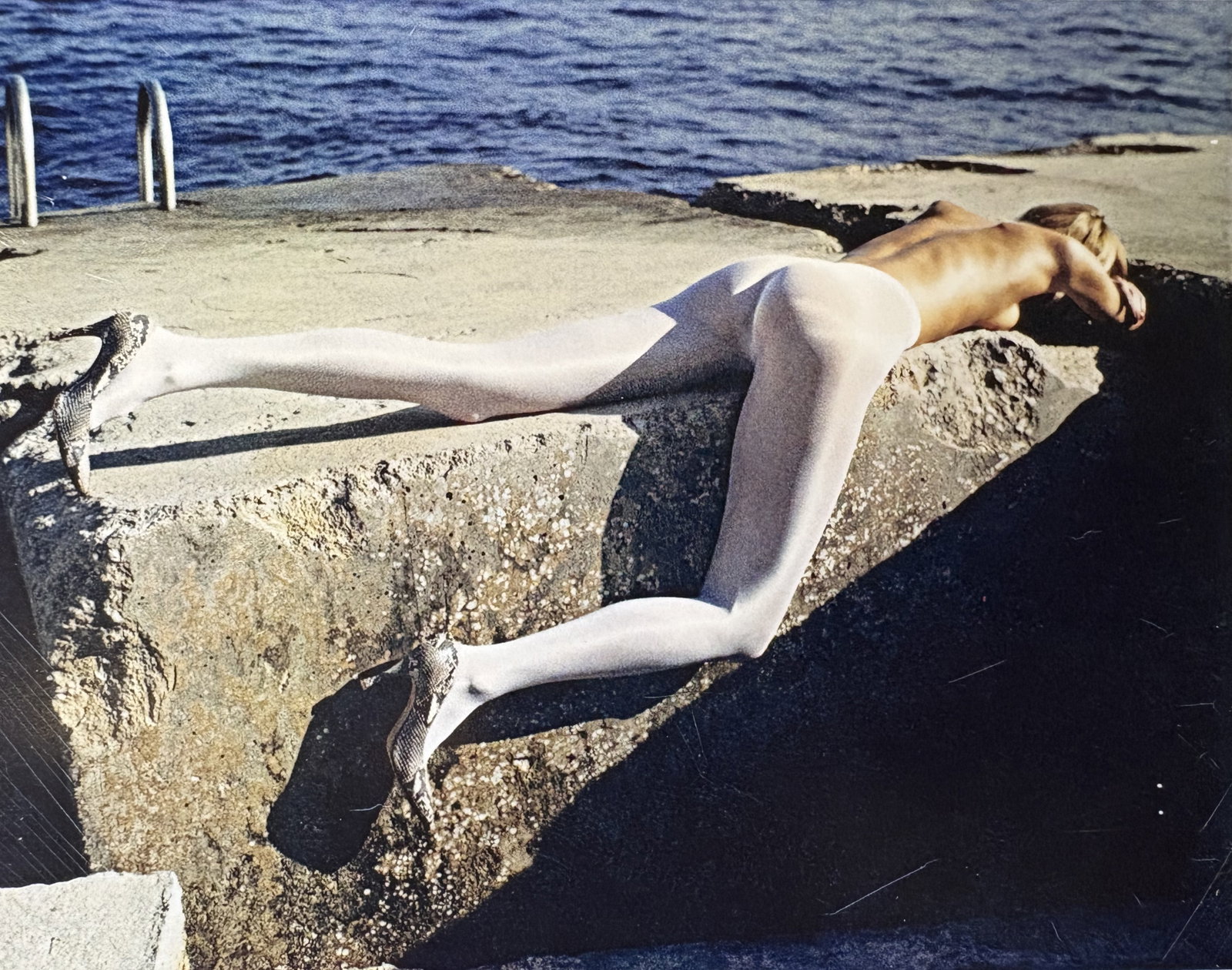 HELMUT NEWTON SEA PRINT: Helmut newton Sea Print mounted to board measuring at 5.5x6.5 inches