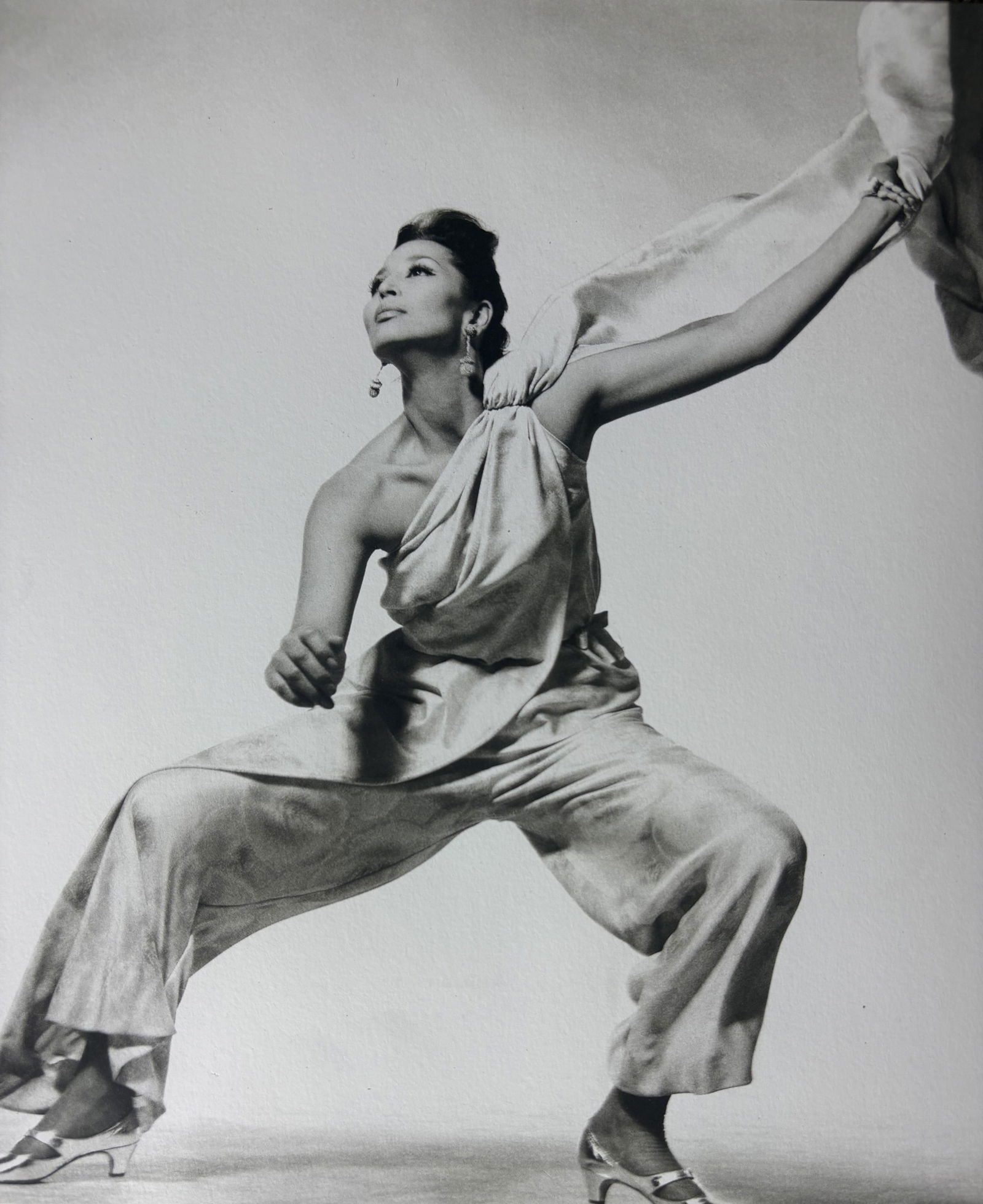 RICHARD AVEDON CHINA MACHADO PHOTO LITHO: Richard Avedon China Machado Photo Litho mounted to board measuring at 8x9.5 inches