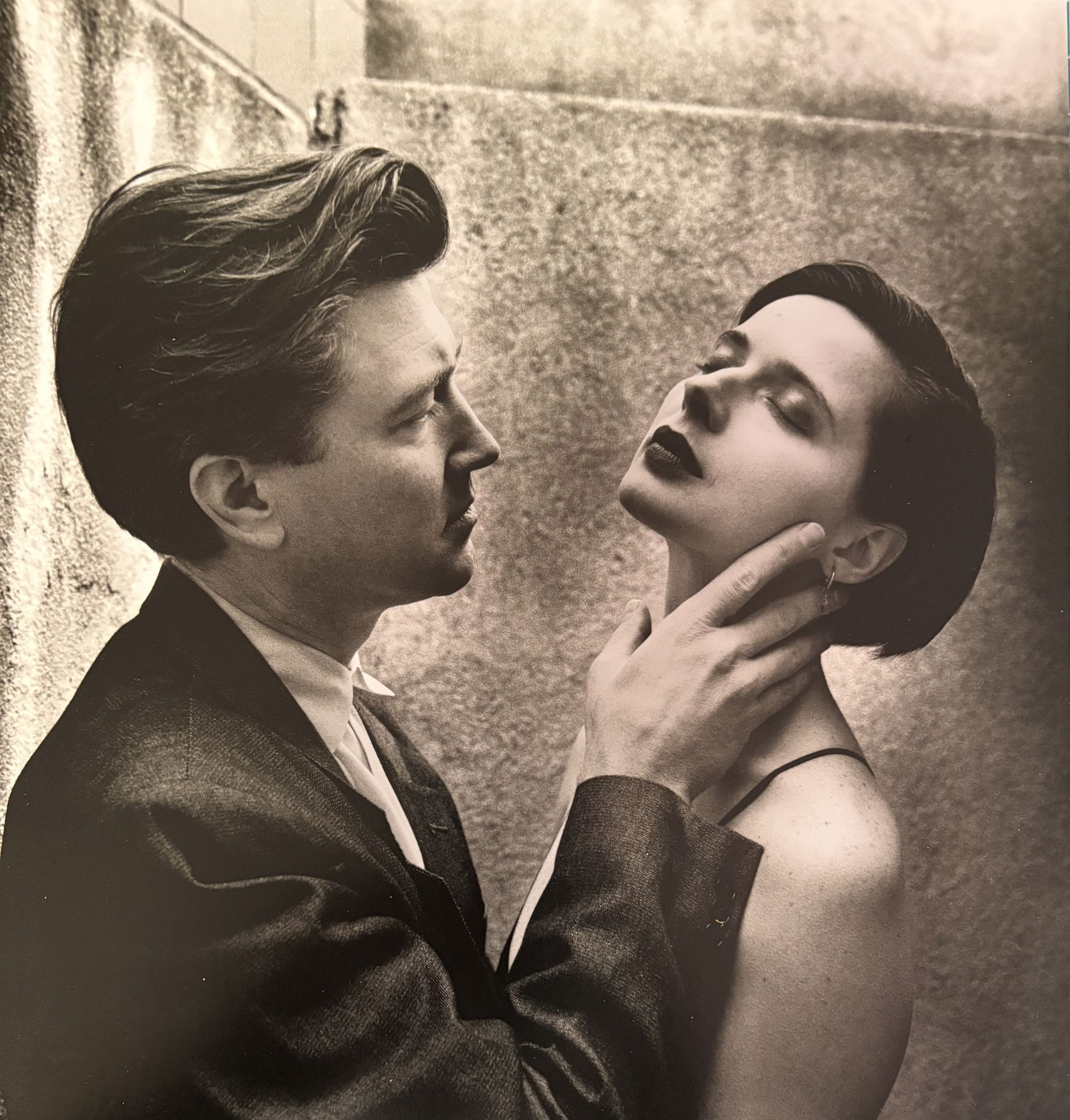 HELMUT NEWTON DAVID LYNCH DUOTONE PRINT: Helmut Newton David Lynch Duotone Print mounted to board measuring at 9.5x9.5 inches.