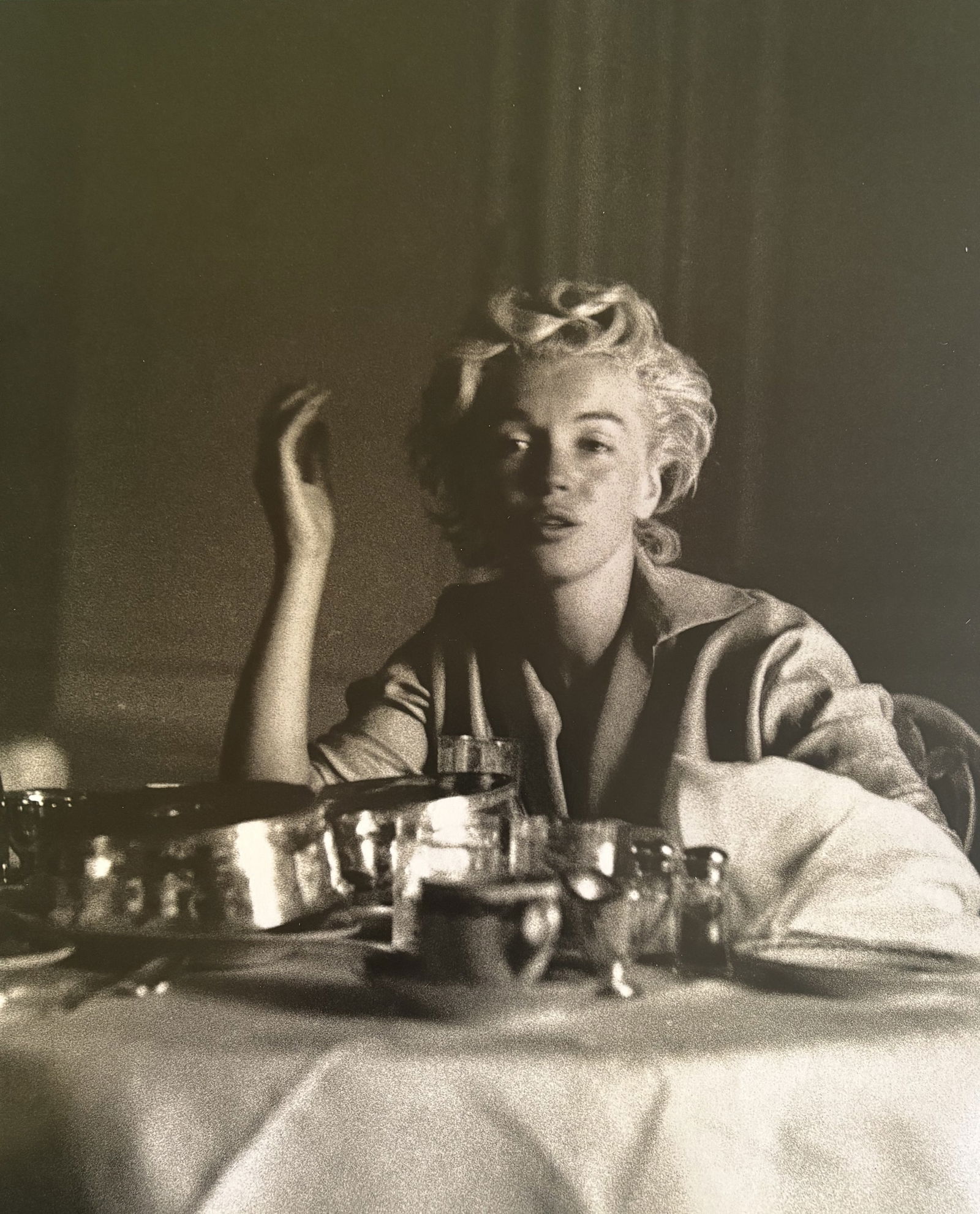MILTON GREENE MARILYN AT DINNER PHOTOGRAVURE: Milton Greene Marilyn at Dinner Photogravure mounted to board measuring at 9.5x12.25 inches