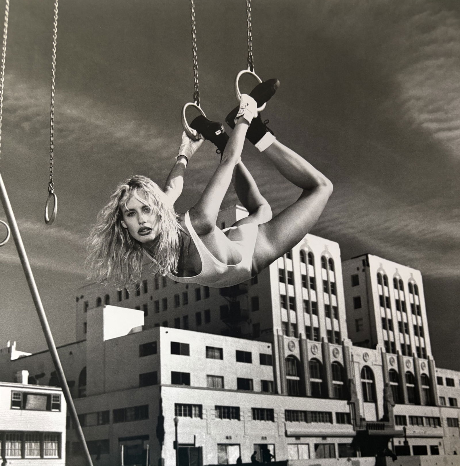 HELMUT NEWTON DARYL HANNAH DUOTONE PRINT: Helmut Newton Daryl Hannah Duotone Print professionally mounted to conservation board measuring at 9.5x9.75 inches.