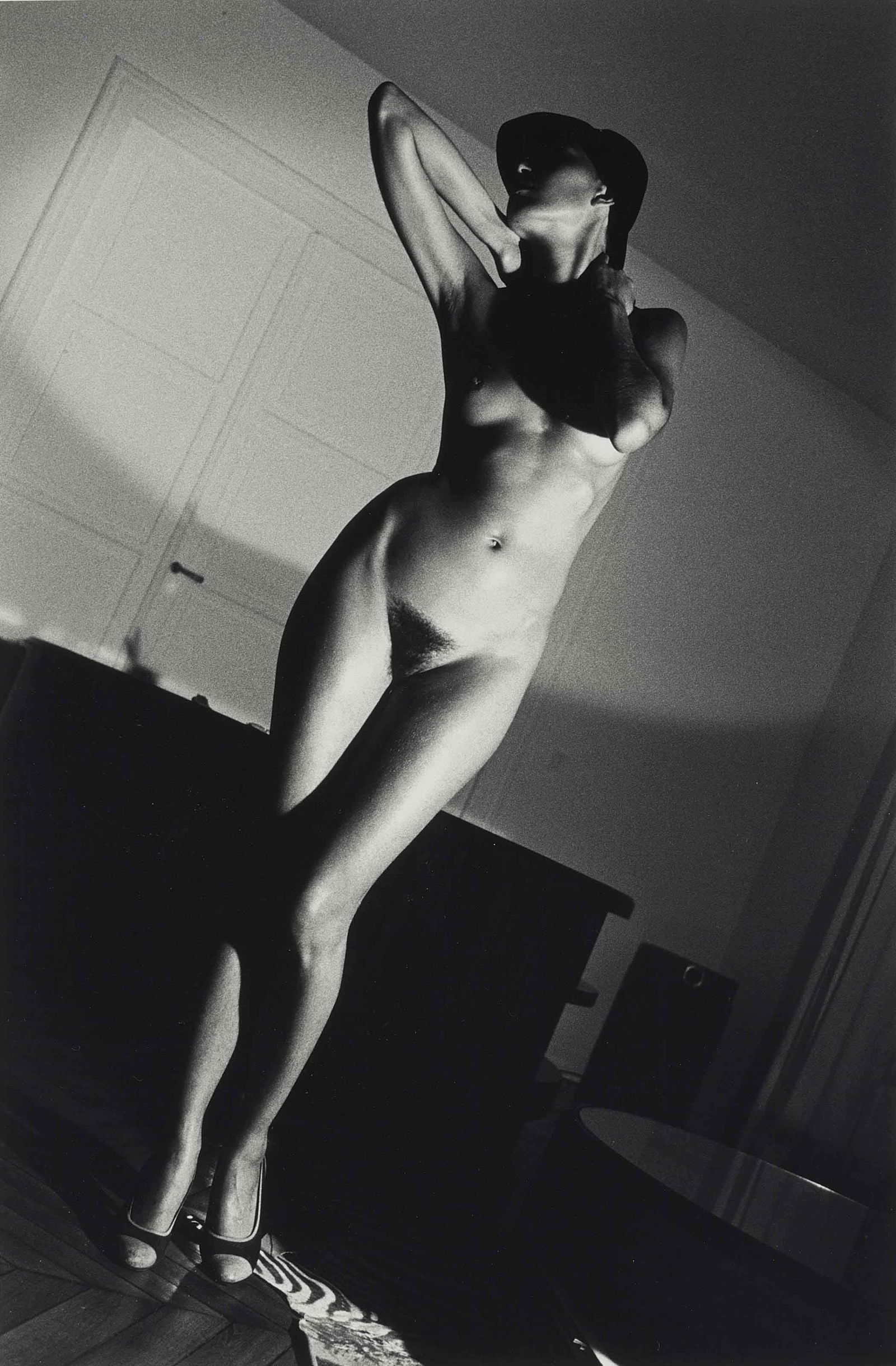 HELMUT NEWTON JENNY IN APARTMENT PRINT: Helmut Newton Jenny in Apartment Print mounted to board measuring at 9.5x14 inches