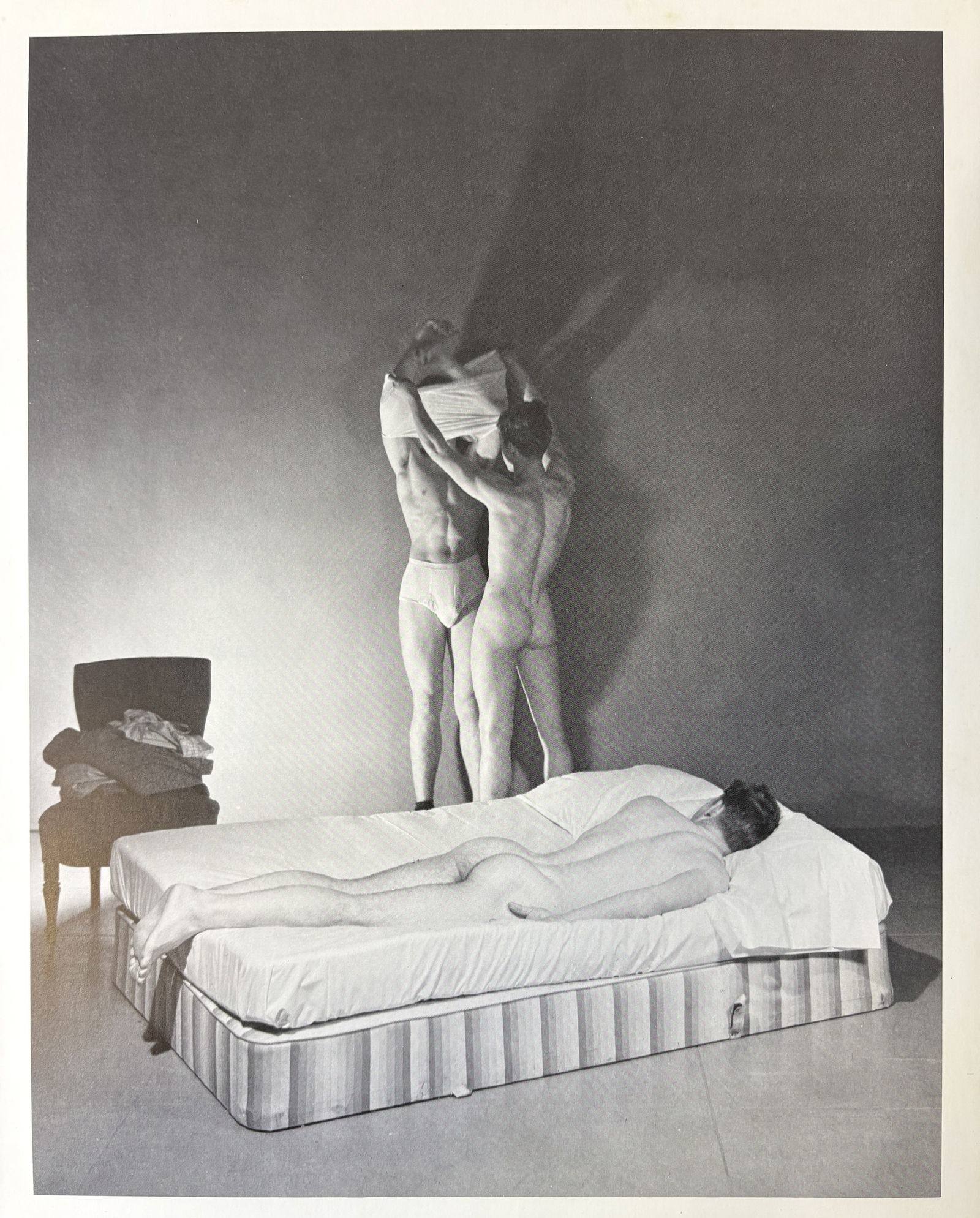 GEORGE PLATT LYNES THREE MALES ON BED LITHO: George Platt Lynes Three Males on Bed Litho mounted to same size board measuring at 9.75x12.25 inches