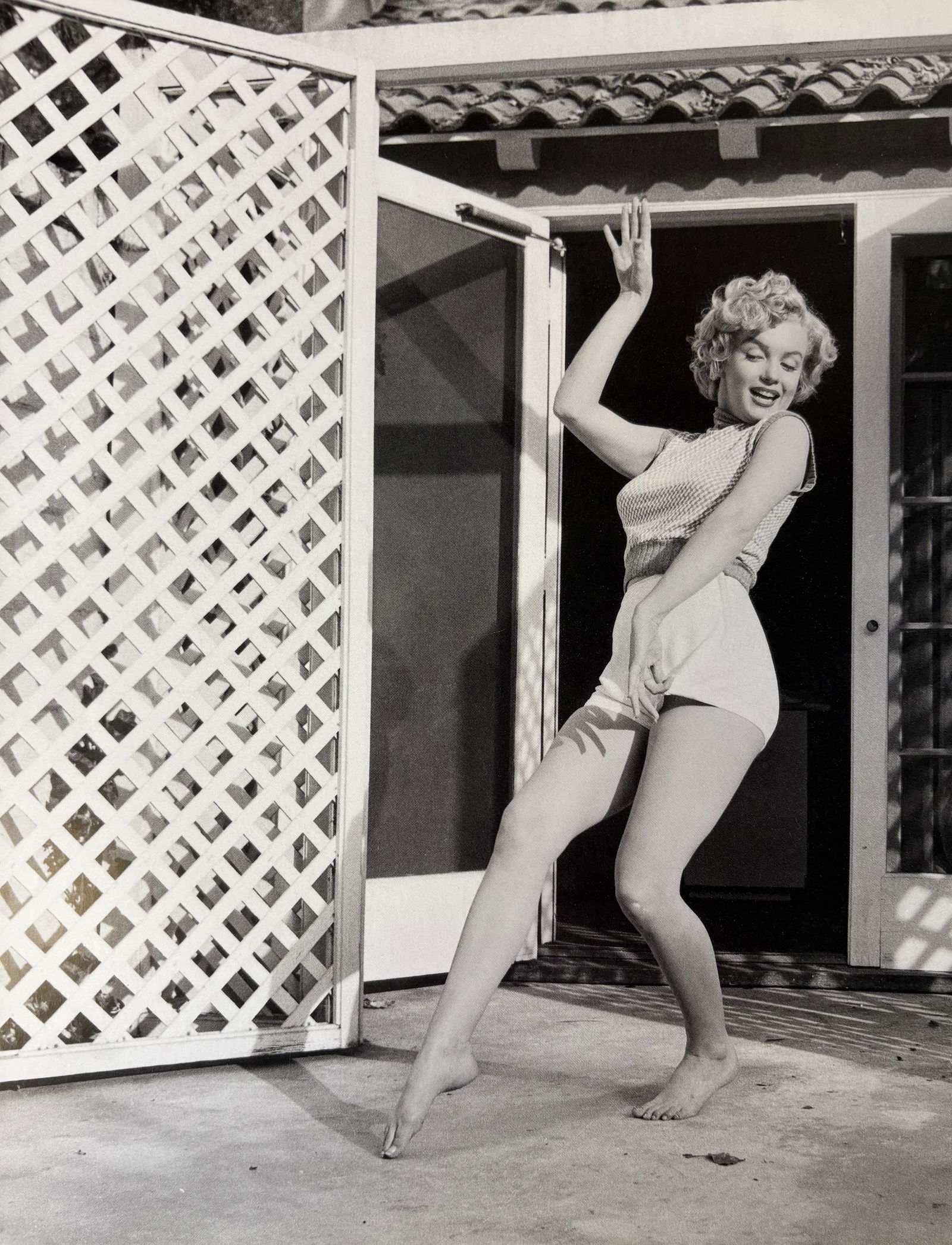 ANDRE DE DIENES MARILYN MONROE PHOTO LITHO: Andre De Dienes Marilyn Monroe photo litho mounted to same size board measuring at 9x12 inches