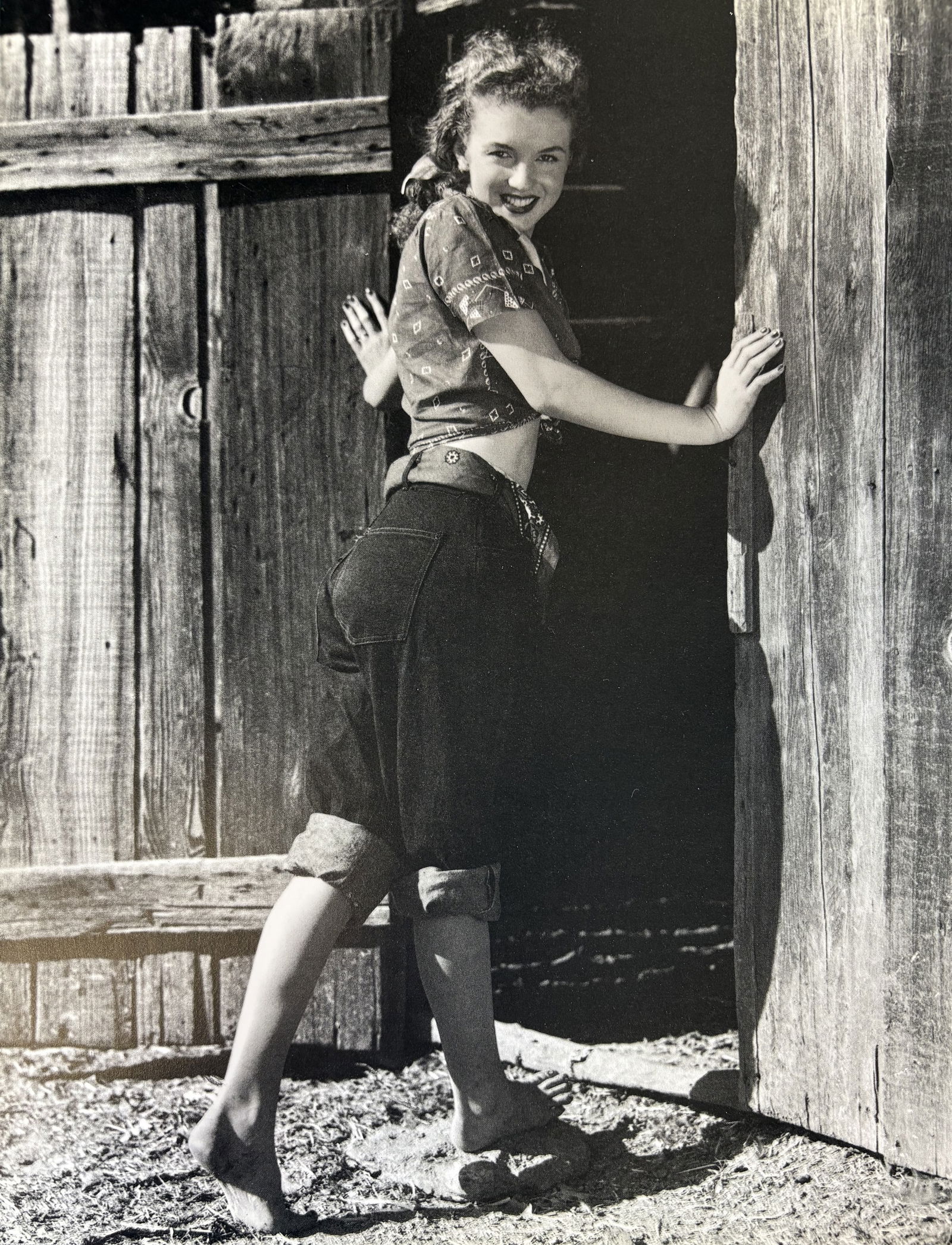 ANDRE DE DIENES MARILYN MONROE PHOTO LITHO: Andre de Dienes Marilyn Monroe Photo Litho mounted to same size board measuring at 9x11.75 inches