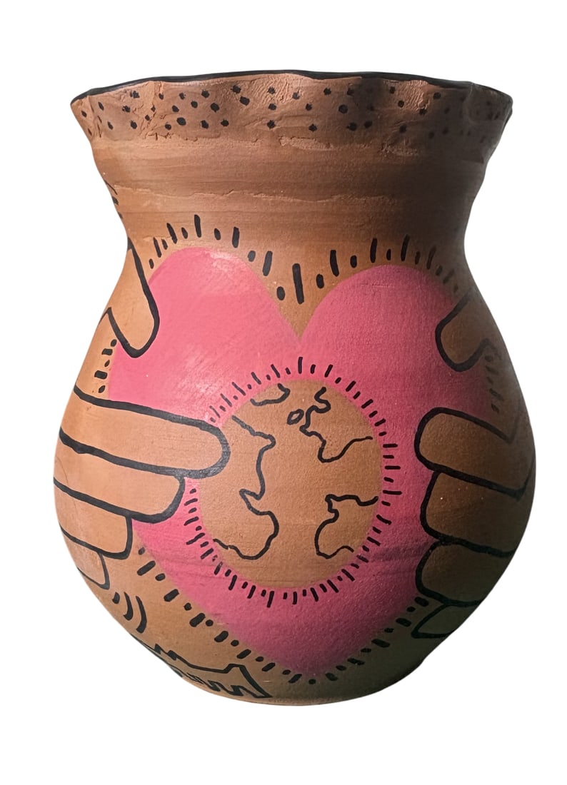 KEITH HARING TERRACOTTA VASE: Keith Haring terracotta Vase measuring at 6x6x7 inches. Marker signed on the bottom. Attributed to keith haring.