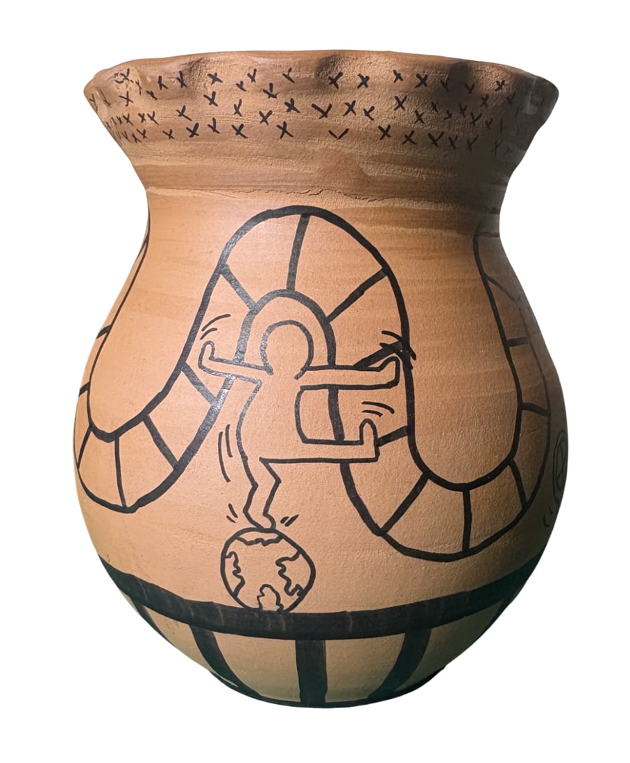 KEITH HARING TERRACOTTA VASE: Keith Haring Terracotta Vase measuring at 6x6x7 inches. Marker drawings all around and hand signed on the bottom. Attributed to Keith Haring.