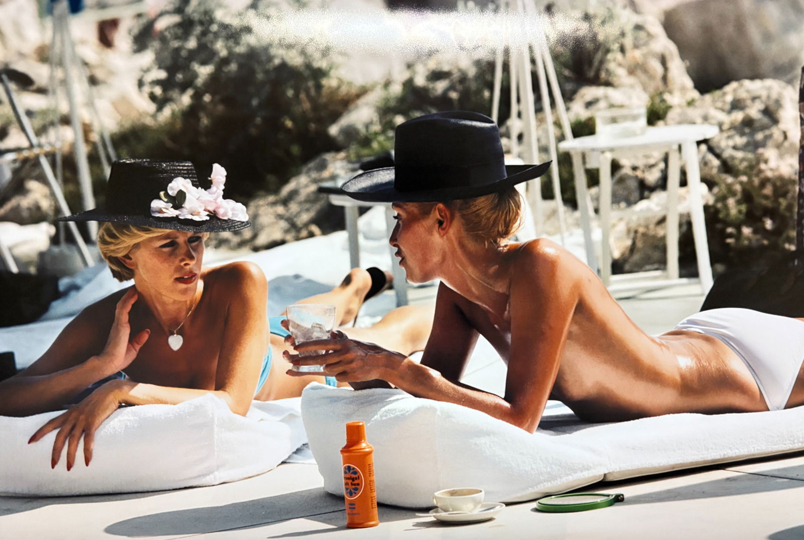 SLIM AARONS SUNBATHING ANTIBES PRINT: Slim Aarons Sunbathing in Antibes Print measuring at 20x30 inches